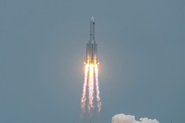 <p>A Long March 5B rocket, carrying China's Tianhe space station core module, lifts off from the Wenchang Space Launch Center in southern China's Hainan province on April 29, 2021</p>