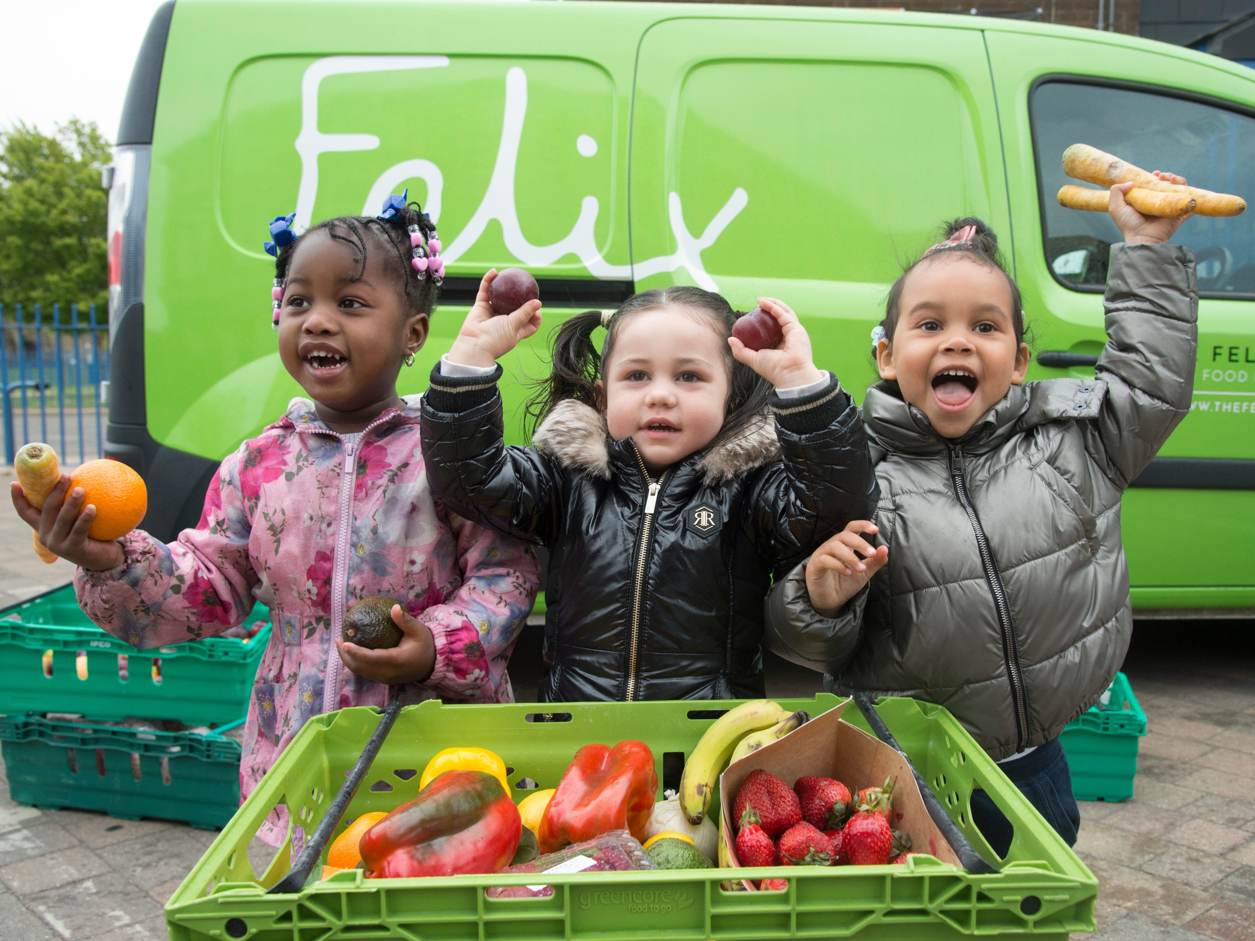 Dream, Aaliyah and Eva Rosie with fruit and veg provided by The Felix Project