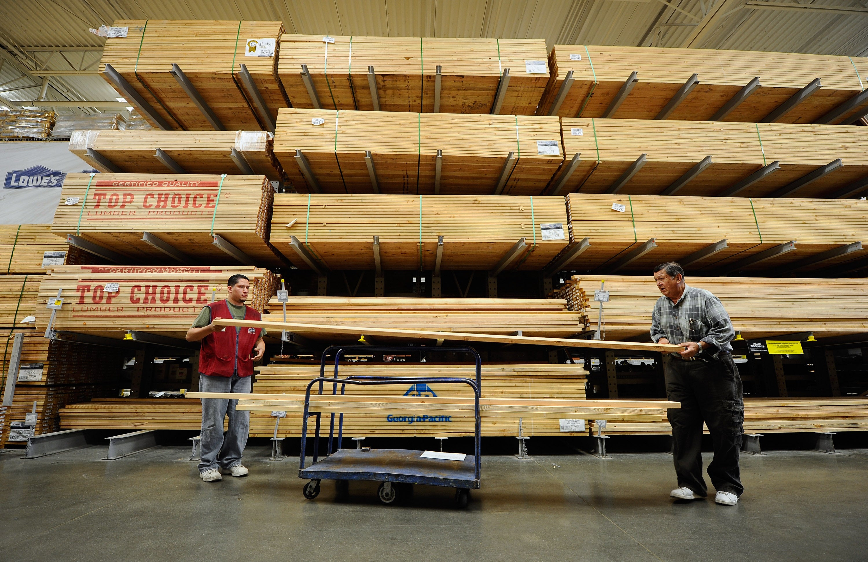 The US has been hit by a lumber shortage during the pandemic which could be partially fuelled by a house building and DIY boom. Pictured is the lumber department at Lowe’s.