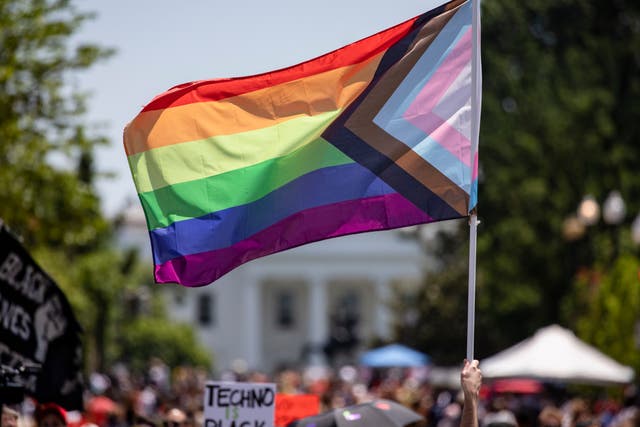 <p>Members and allies of the LGBTQ community reach Black Lives Matter Plaza across the street from the White House as part of the Pride and Black Lives Matter movements on 13 June, 2020 in Washington, DC</p>