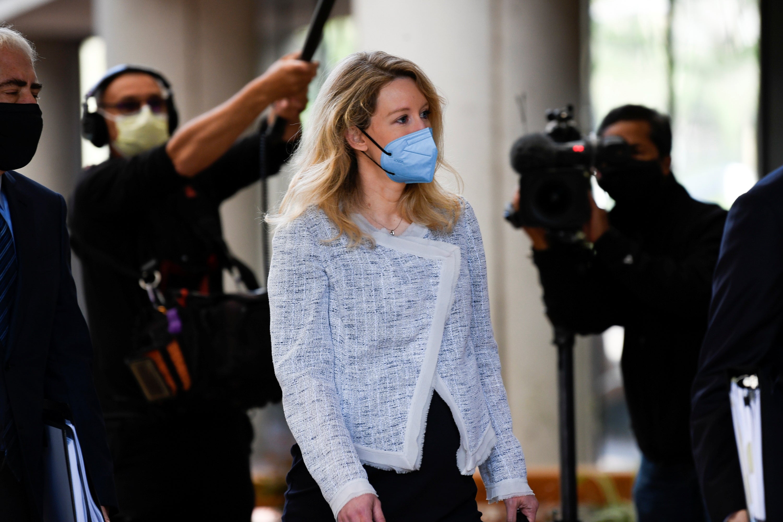 Theranos founder Elizabeth Holmes arrives at the Robert F. Peckham Federal Building to attend a federal court hearing in San Jose, California