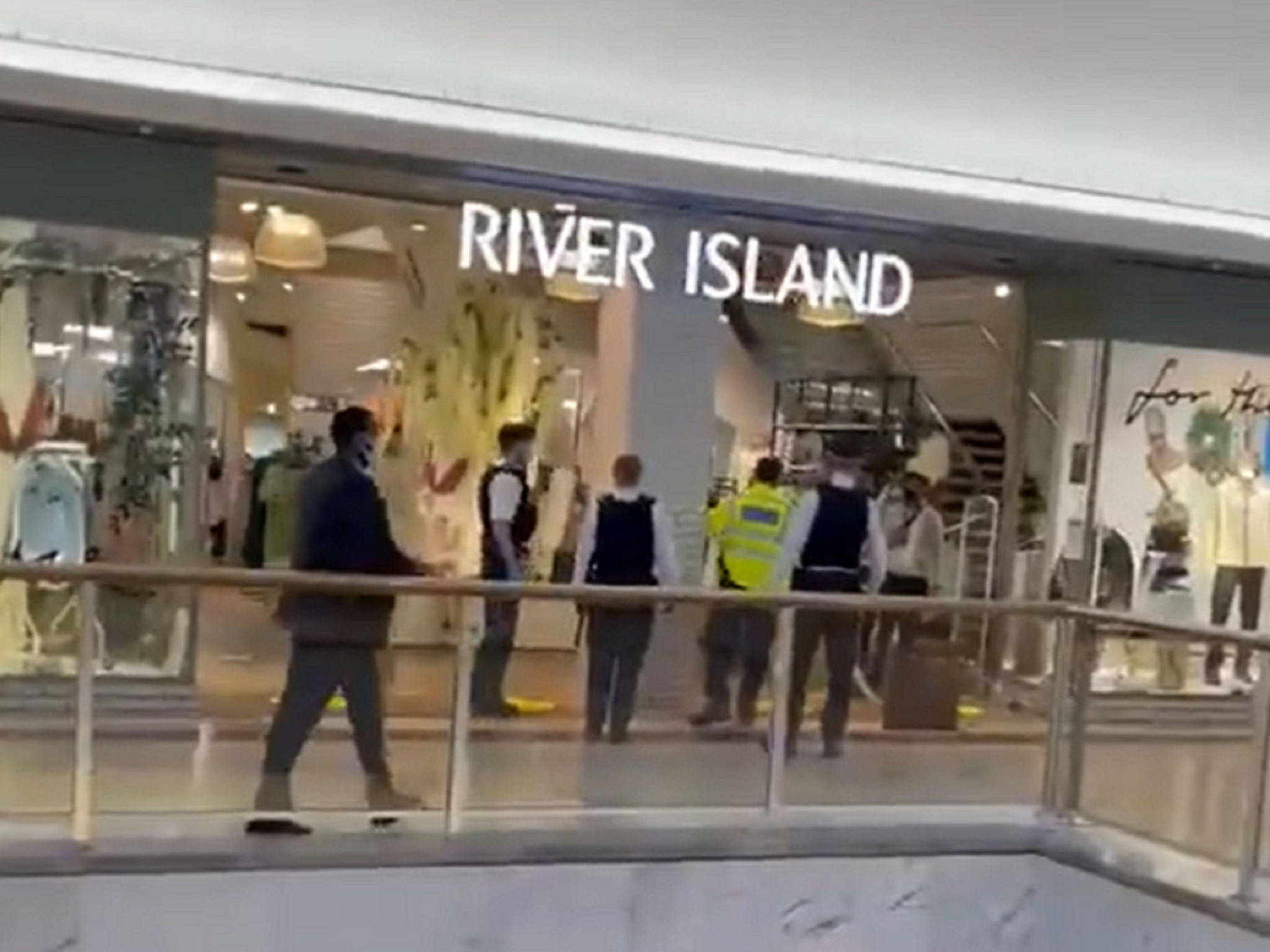 Video footage from inside Brent Cross Shopping Centre in north London appears to show a police cordon after a 21-year-old man was stabbed to death.