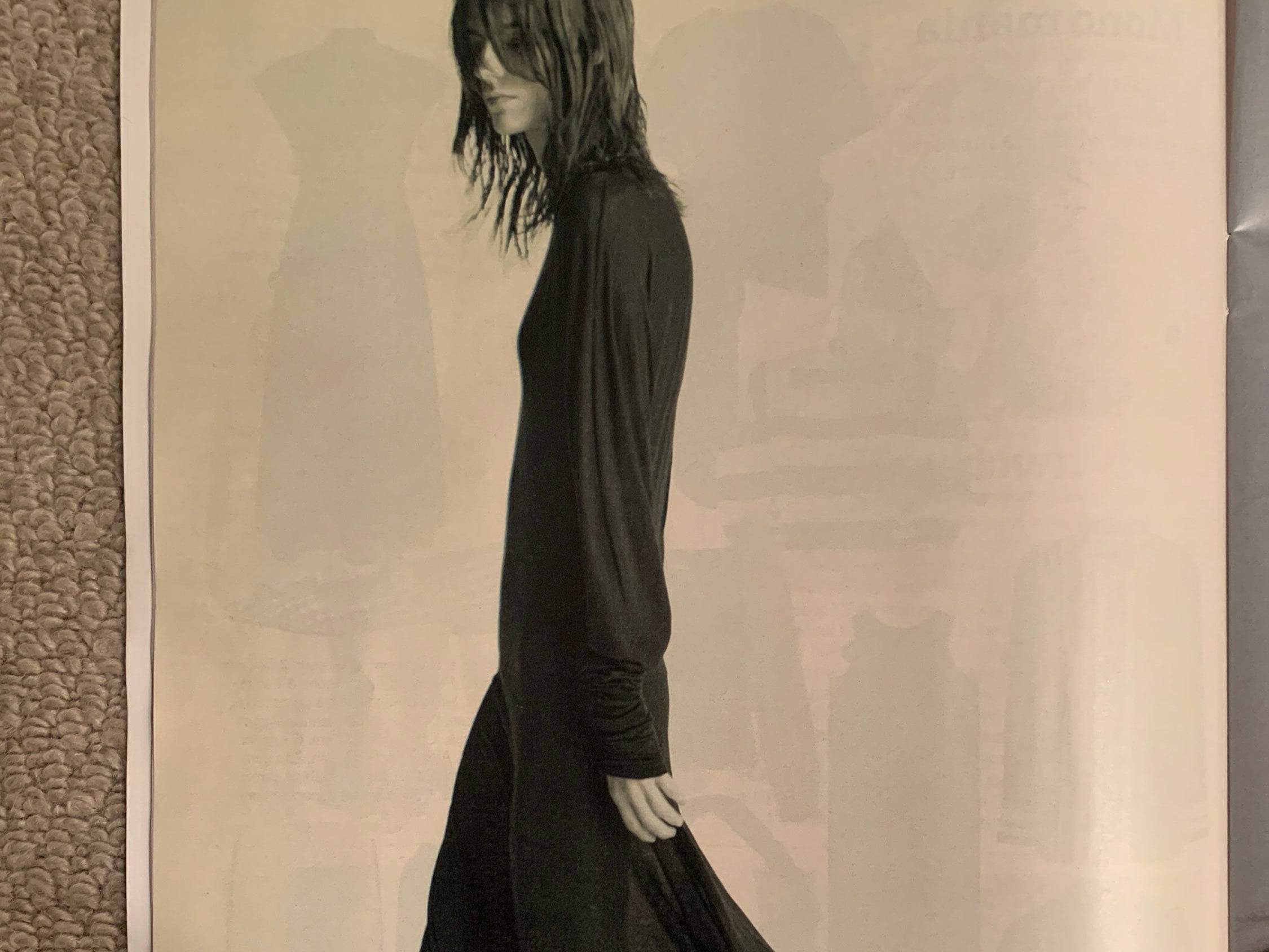 Photo issued by Advertising Standards Authority (ASA) showing an ad for Sportmax, a subsidiary label of Max Mara, seen in The Sunday Times Style magazine on 28 February, which featured a female model pictured from the side and wearing a long-sleeved ankle length black dress with boots