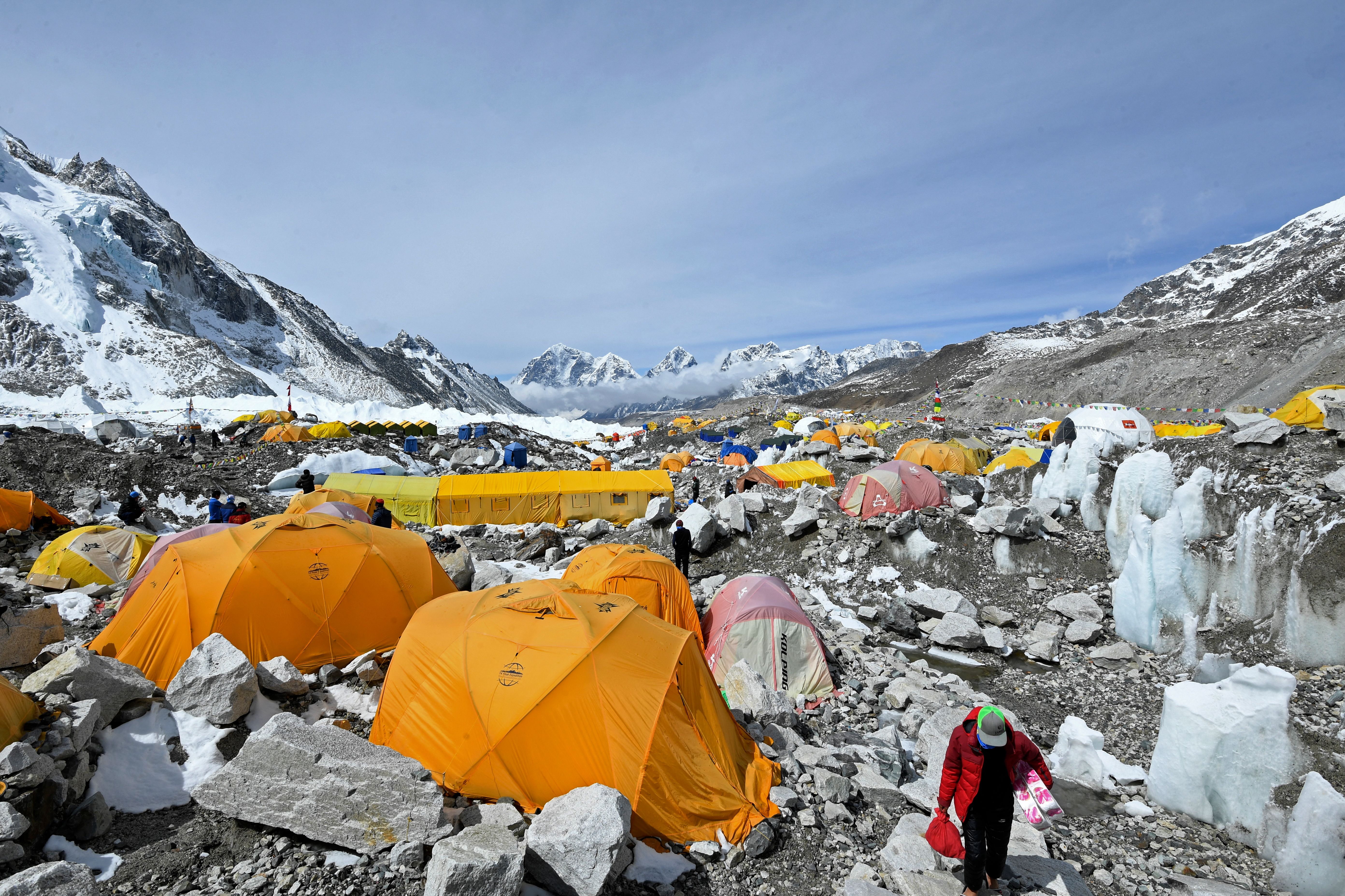 Tents of mountaineers are pictured at the Everest base camp in the Mount Everest region of Solukhumbu district on May 3, 2021. Nepal Mountaineering Association has asked climbers to bring back empty oxygen canisters amid the oxygen shortage in hospitals across country.