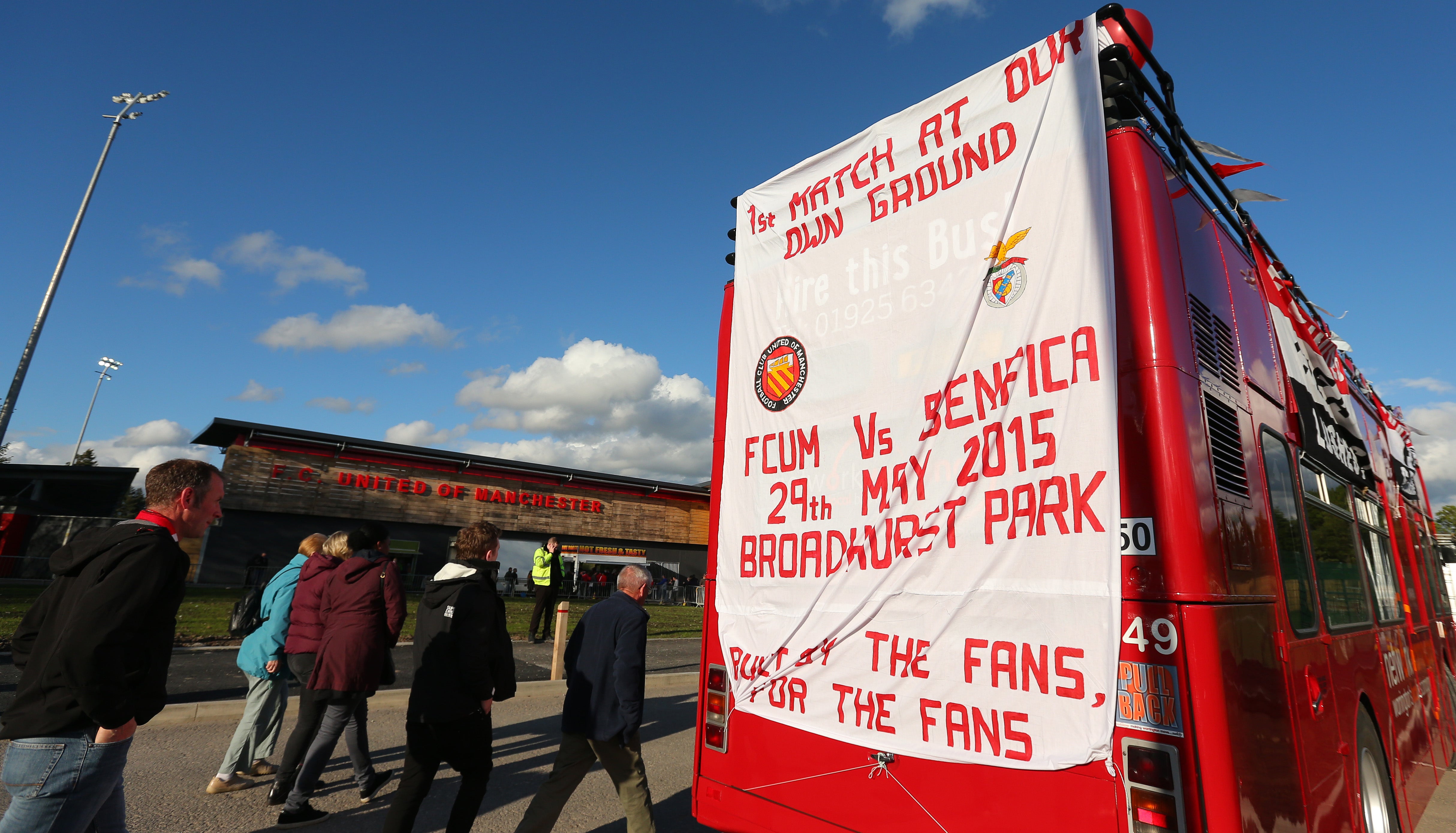 FC United of Manchester fans attend a friendly against Benfica, the first game at the club’s new Broadhurst Park stadium, Moston, on 29 May 2015