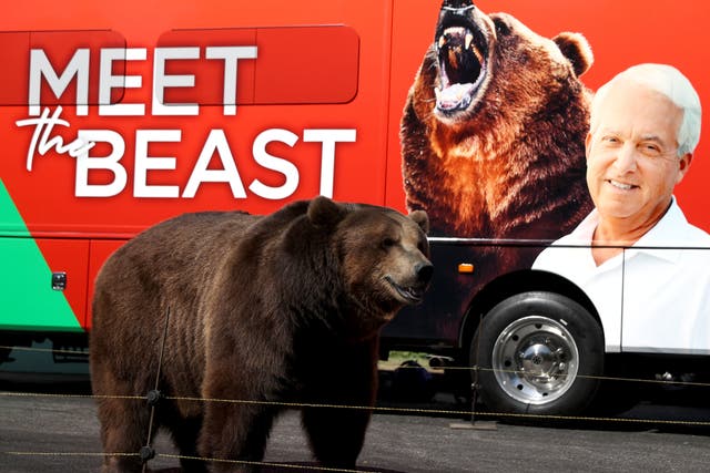 <p>A 1,000 pound bear stands in front of the campaign bus for California republican gubernatorial candidate John Cox during a campaign rally at Miller Regional Park on 4 May, 2021 in Sacramento, California</p>