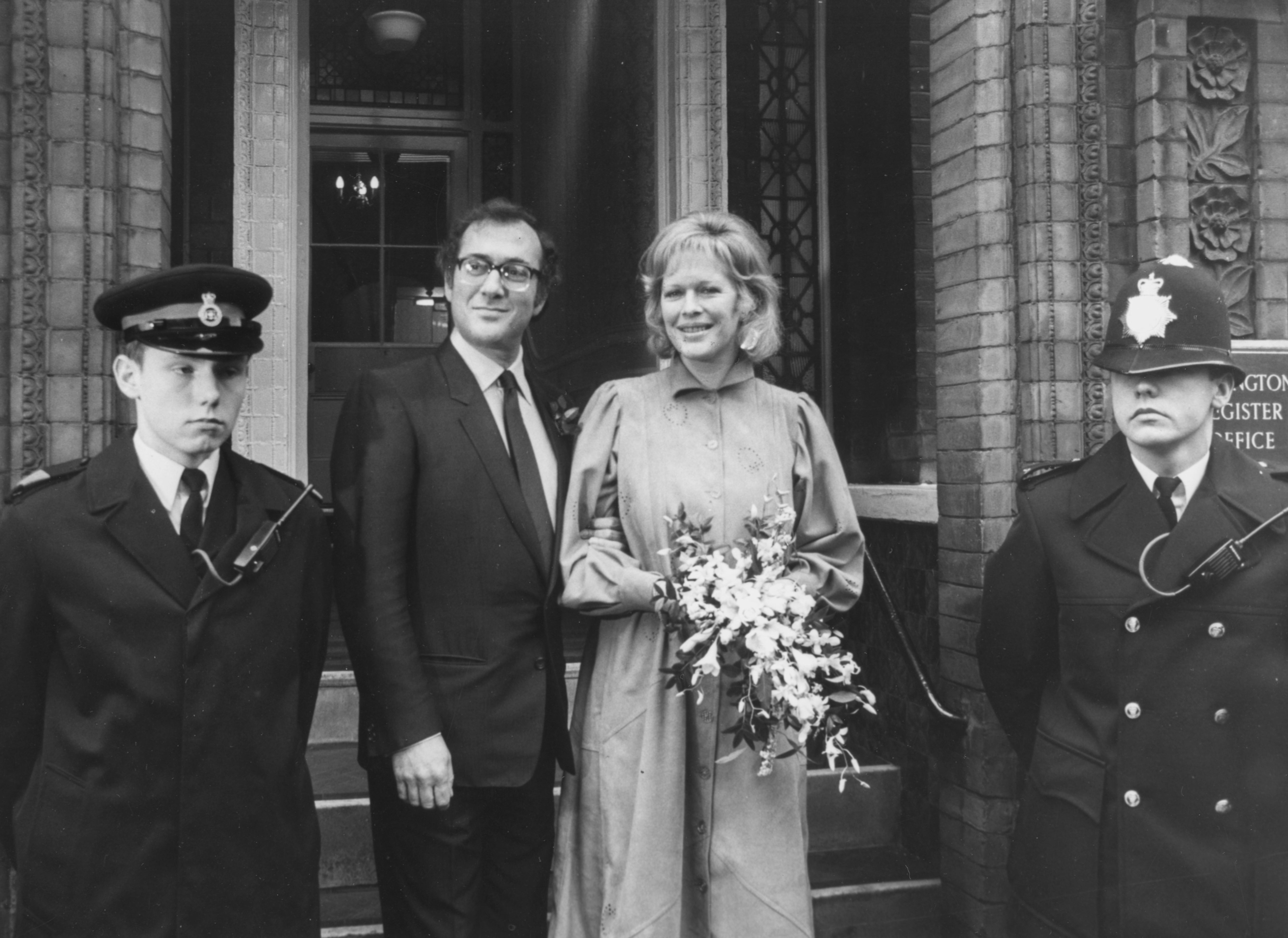 Fraser and Harold Pinter outside Kensington Registry Office following their wedding ceremony in 1980