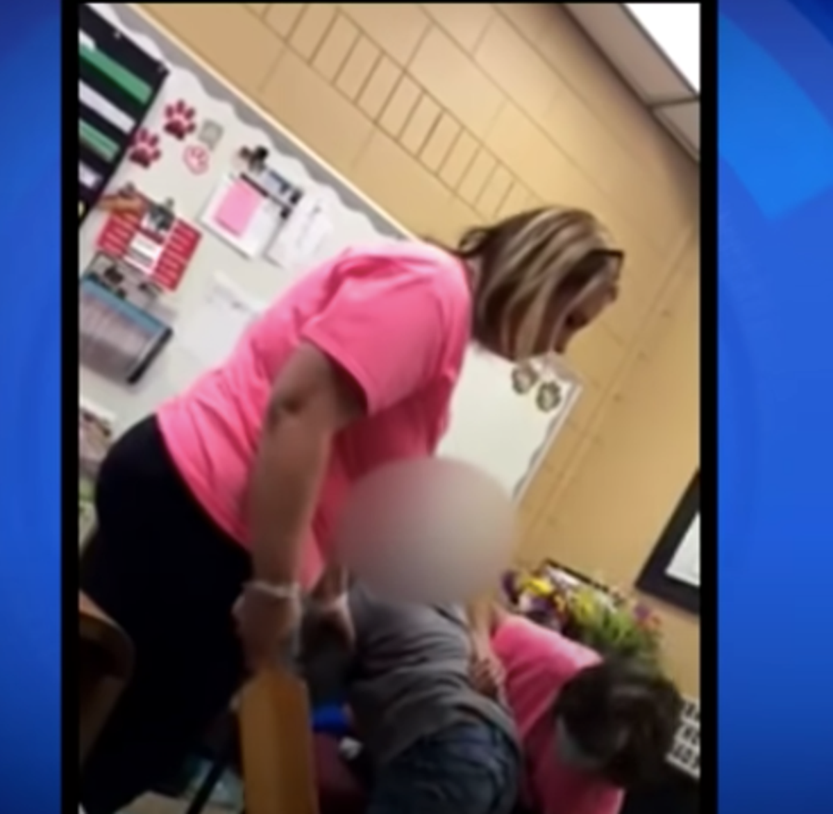Police teacher on camera spanking child with a paddle | The Independent