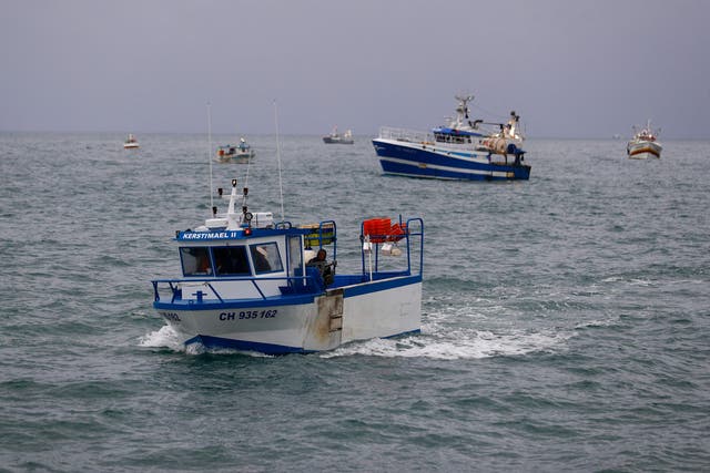 French fishing boats protest in front of the port of St Helier off the British island of Jersey to draw attention to what they see as unfair restrictions on their ability to fish in UK waters after Brexit on 6 May 2021
