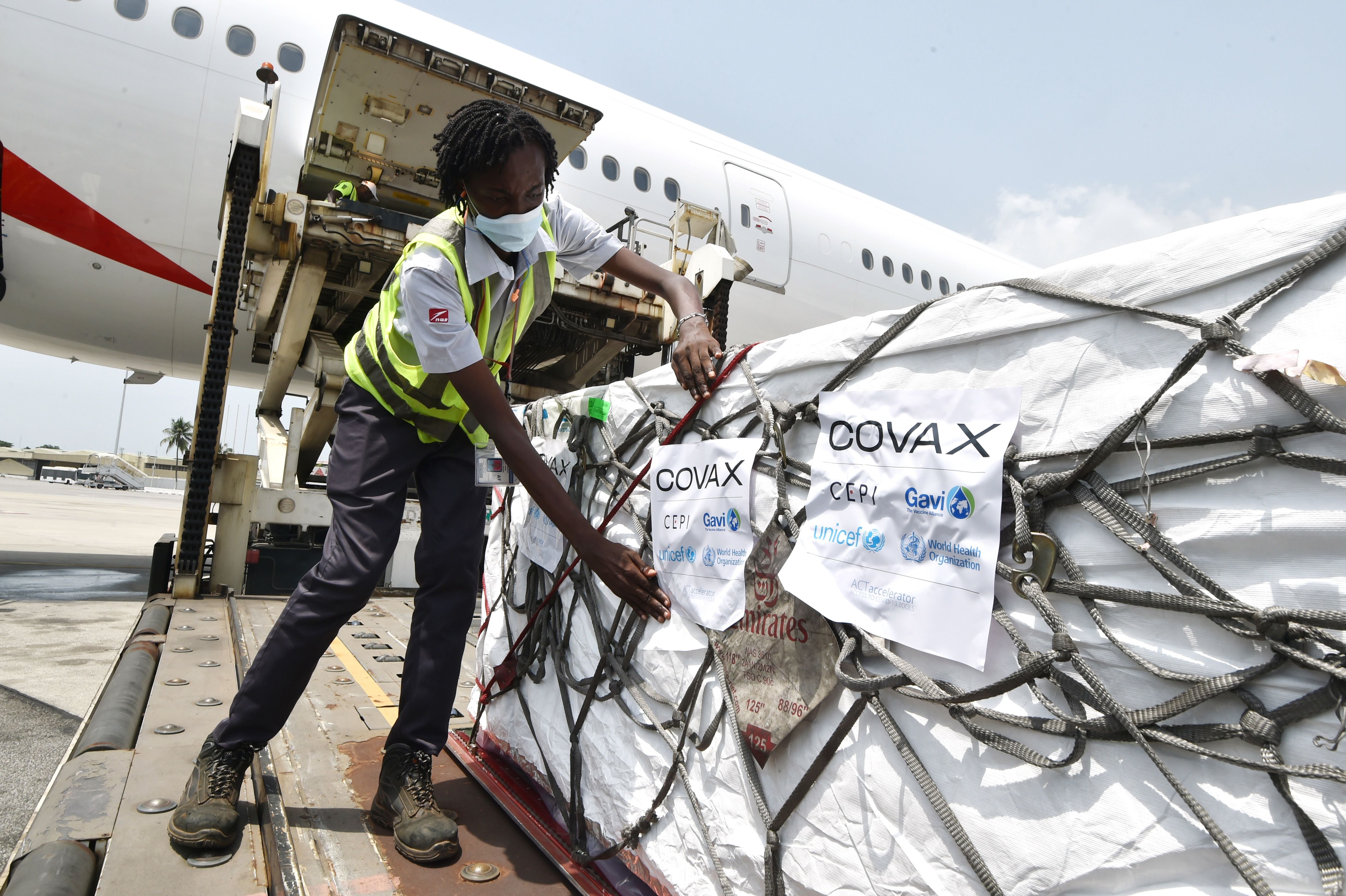 Covax stickers are stuck to a shipment of the AstraZeneca vaccine in Ivory Coast