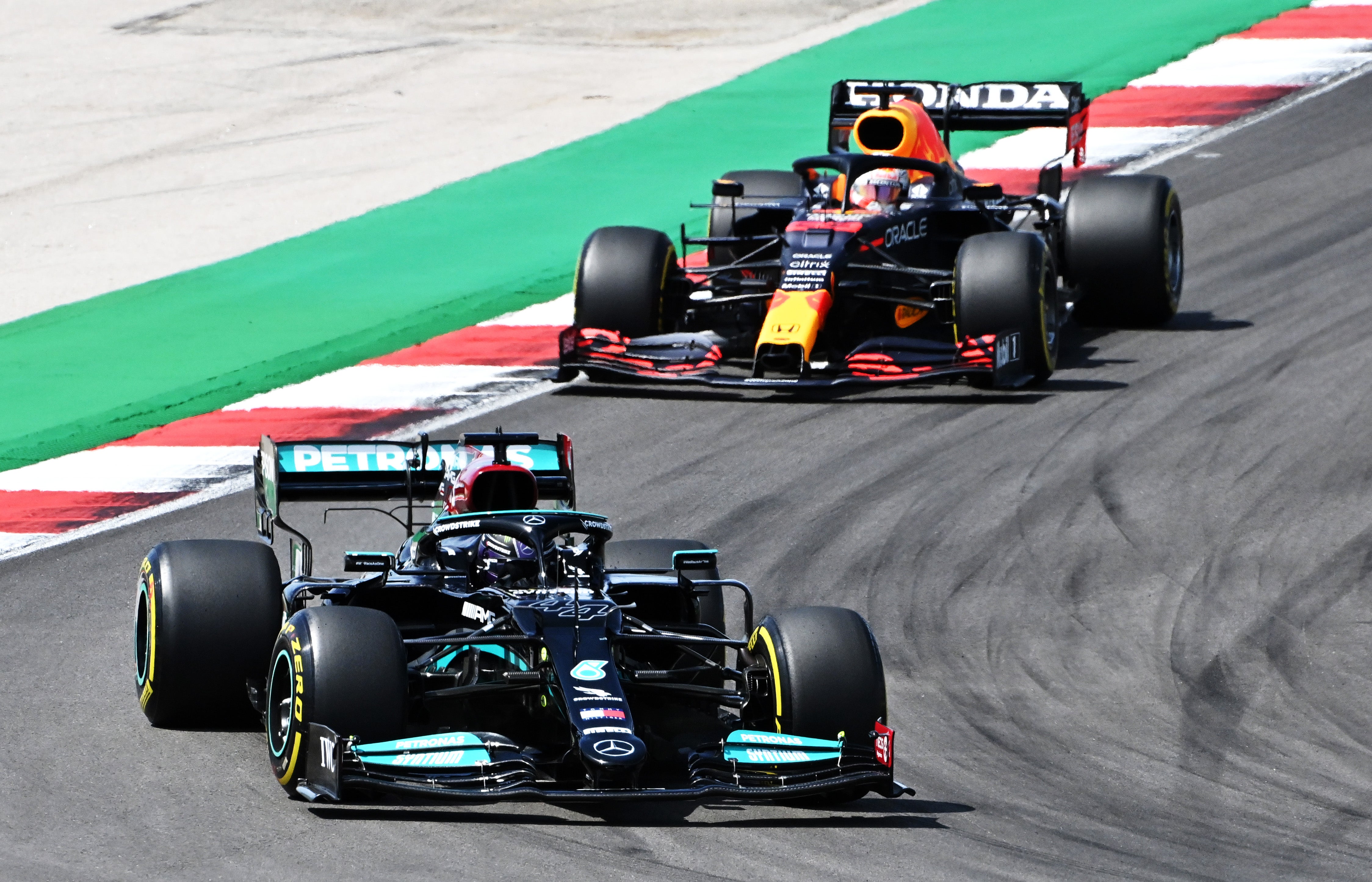 The Red Bull of Max Verstappen in pursuit of Lewis Hamilton during the Portuguese Grand Prix