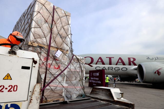 <p>Workers load 300 tonnes of medical aid to be flown in a three-flight cargo aircraft convoy directly to destinations in India</p>