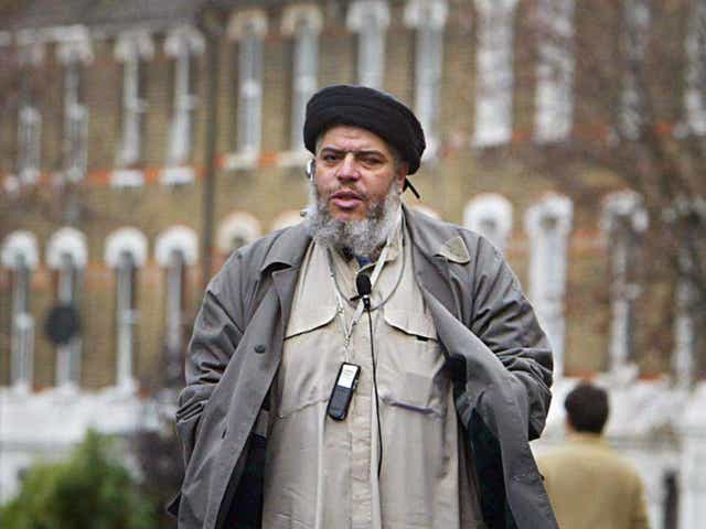  Imam Abu Hamza al-Masri addresses followers during Friday prayer in near Finsbury Park mosque in north London, in this 26 March 2004 file photo