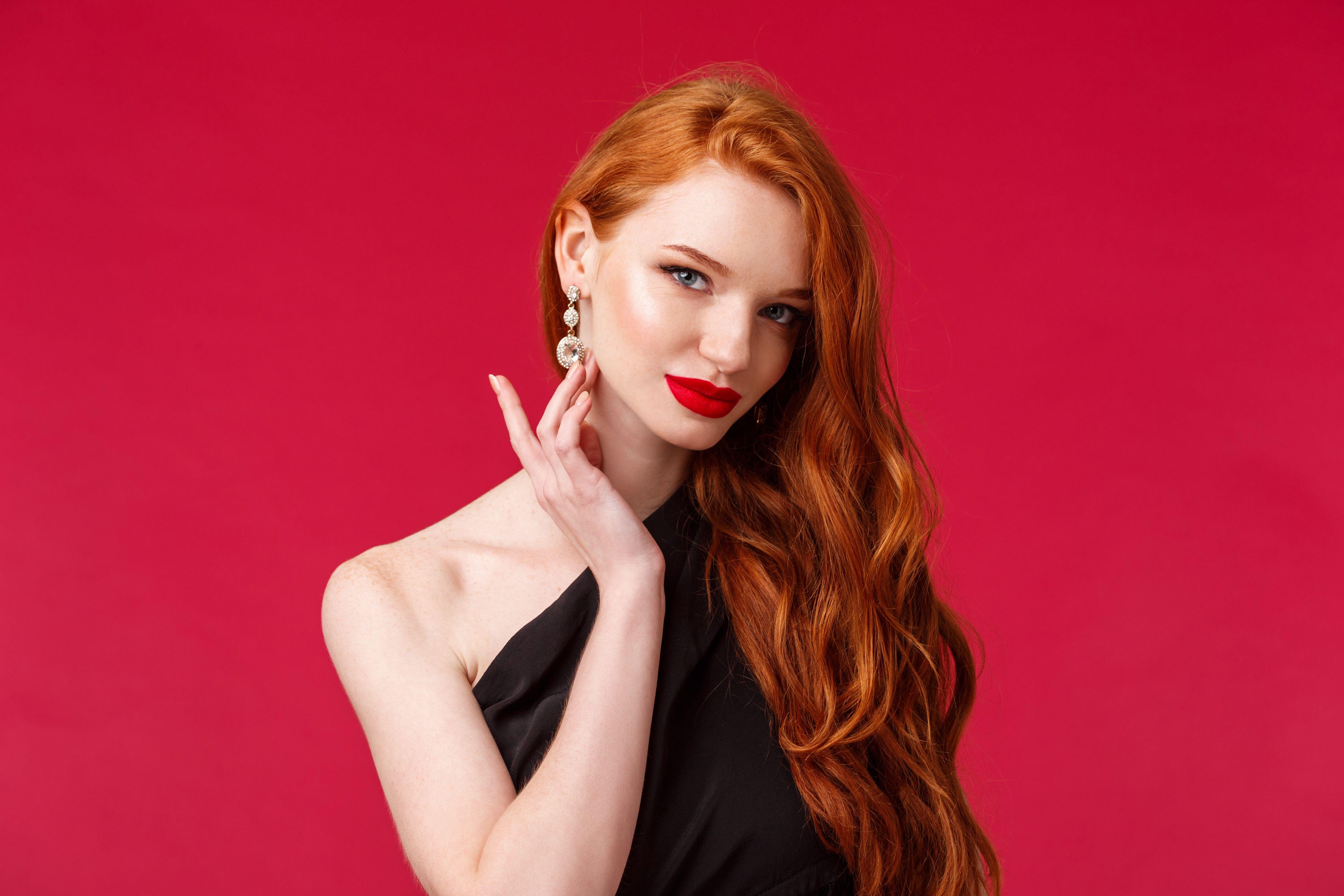 red haired woman wearing red lipstick