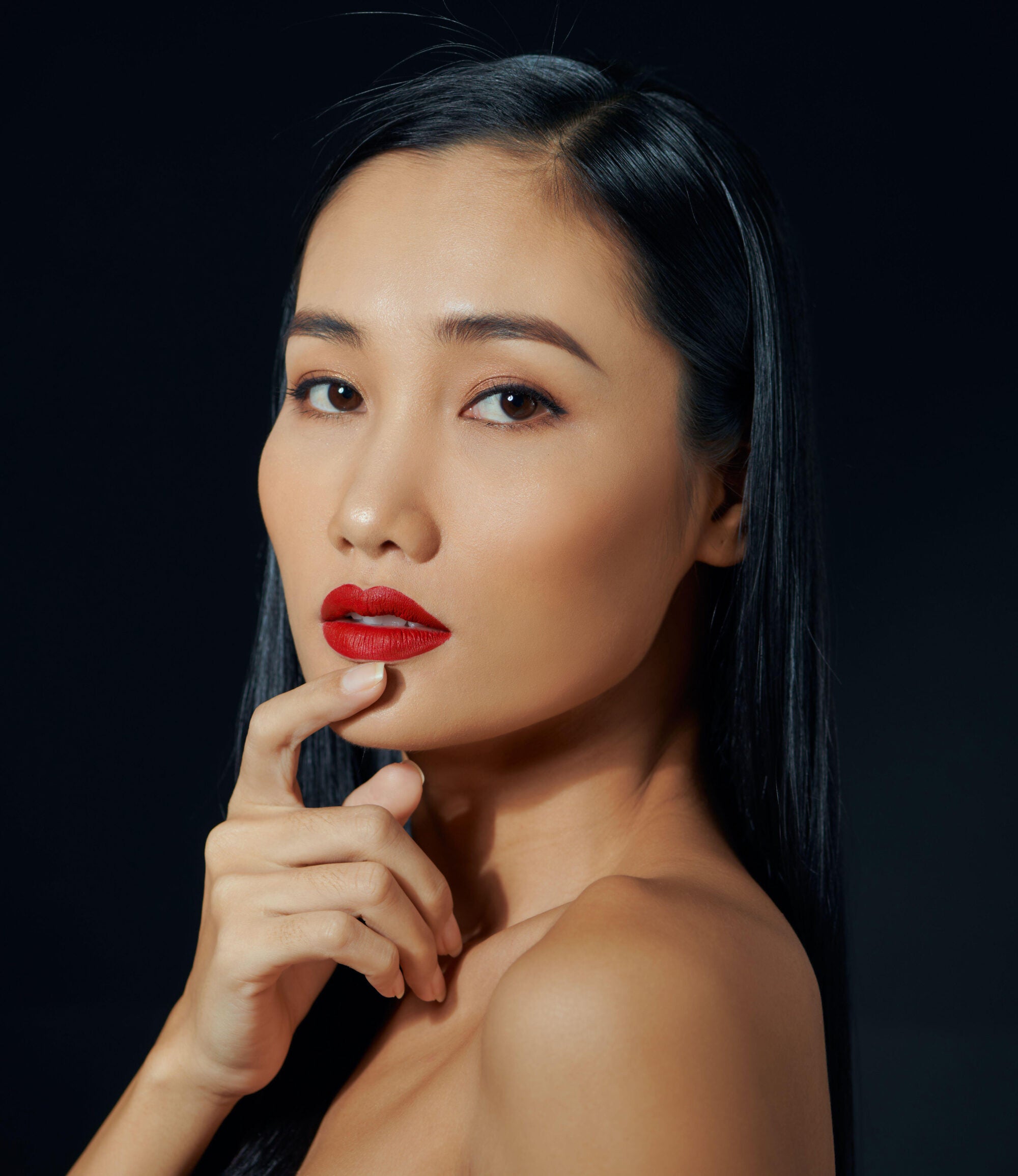 Asian woman wearing red lipstick