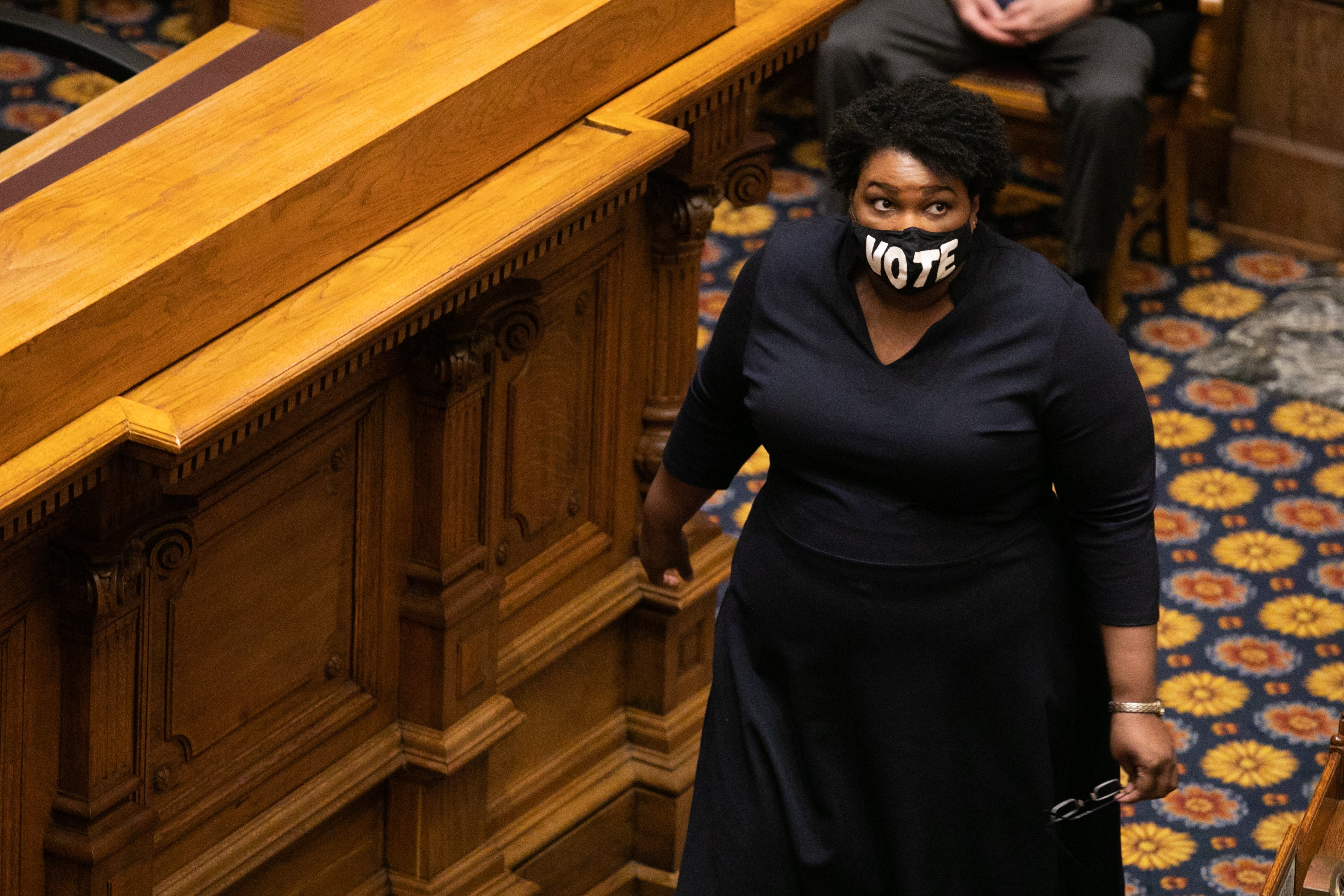 Abrams in the Senate chambers to cast her Electoral College vote at the Georgia State Capitol in December 2020