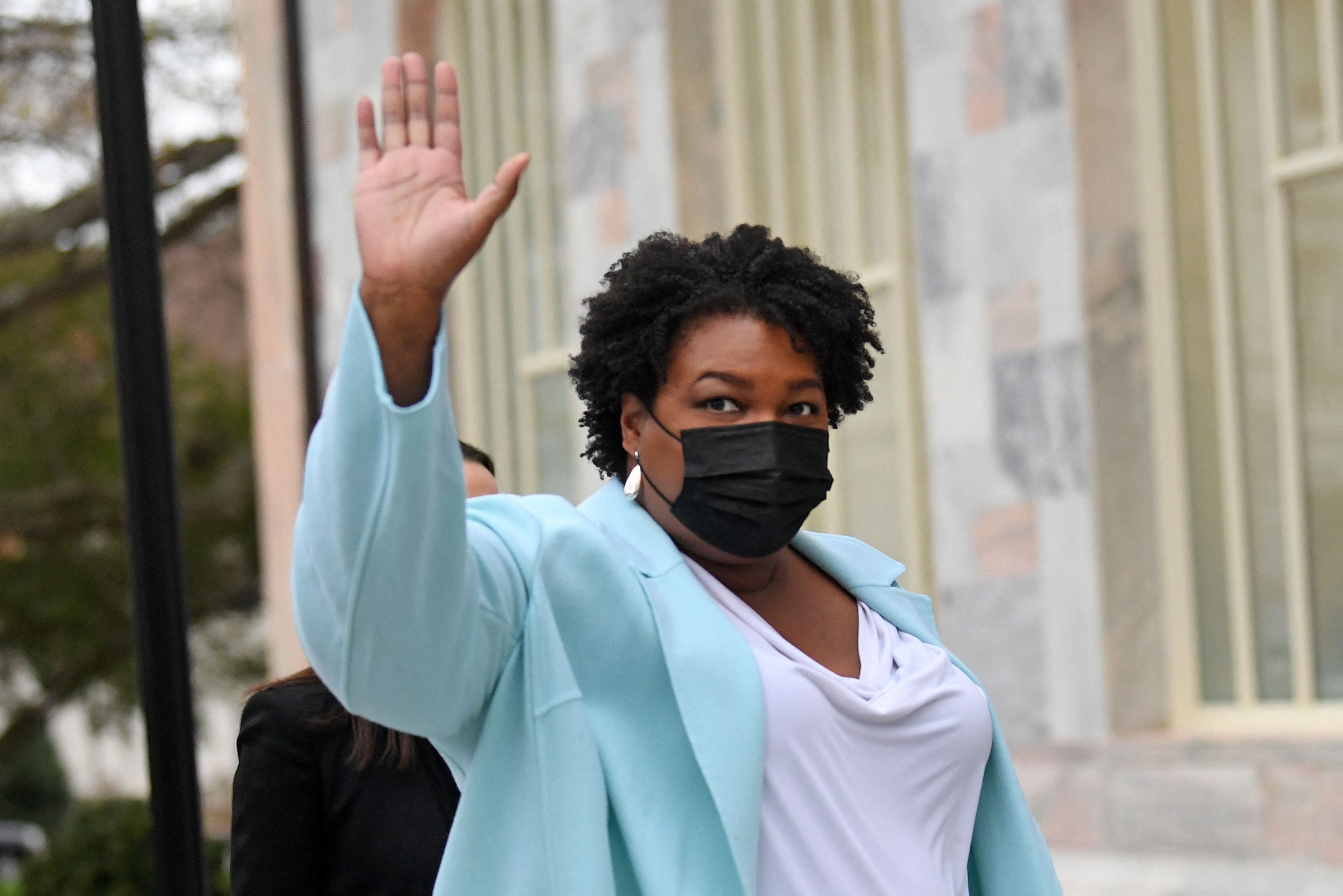 Author, activist and politician Stacey Abrams arrives to meet with US President Joe Biden at Emory University in Atlanta, Georgia