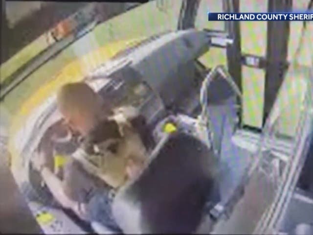 <p>CCTV footage showing a hijacking of a school bus in South Carolina on Thursday</p>
