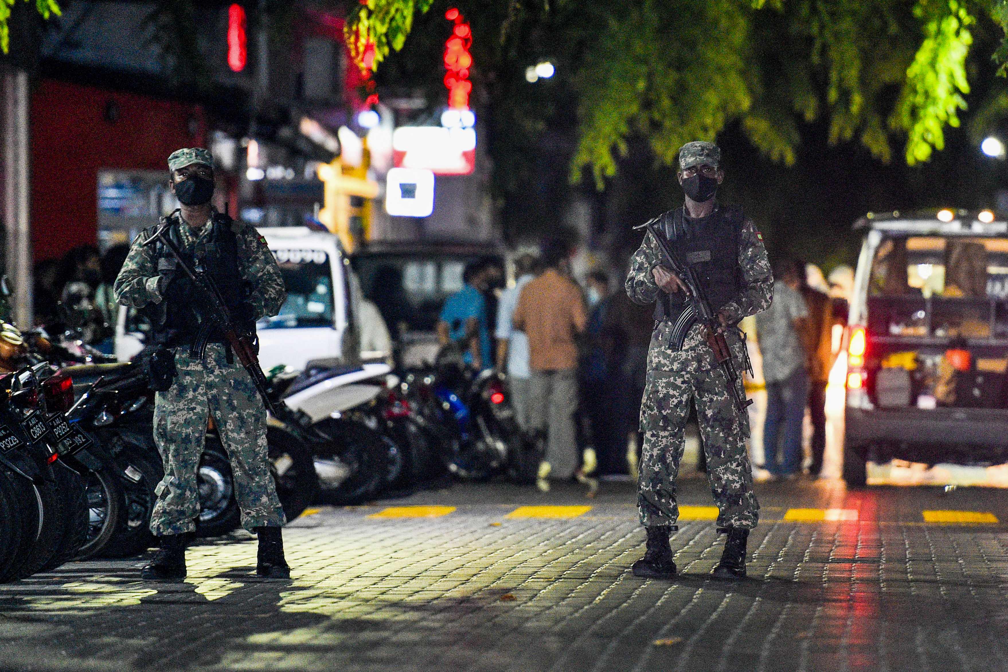 Soldiers secure a site after a bomb blast injured former Maldives president Mohamed Nasheed in Male