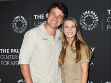 Bindi Irwin celebrates her first Mother’s Day with portrait showing her late father holding her daughter