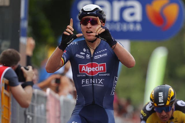 <p>Tim Merlier celebrates after winning the first sprint of the 2021 Giro D’Italia </p>