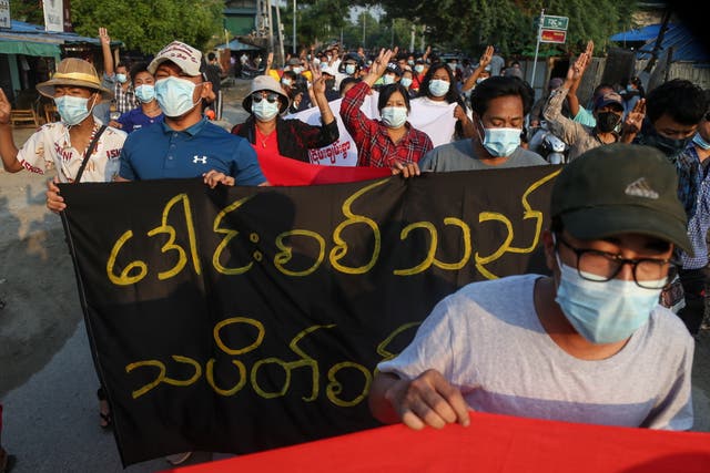 <p>Demonstrators march during an anti-military coup protest in Mandalay</p>