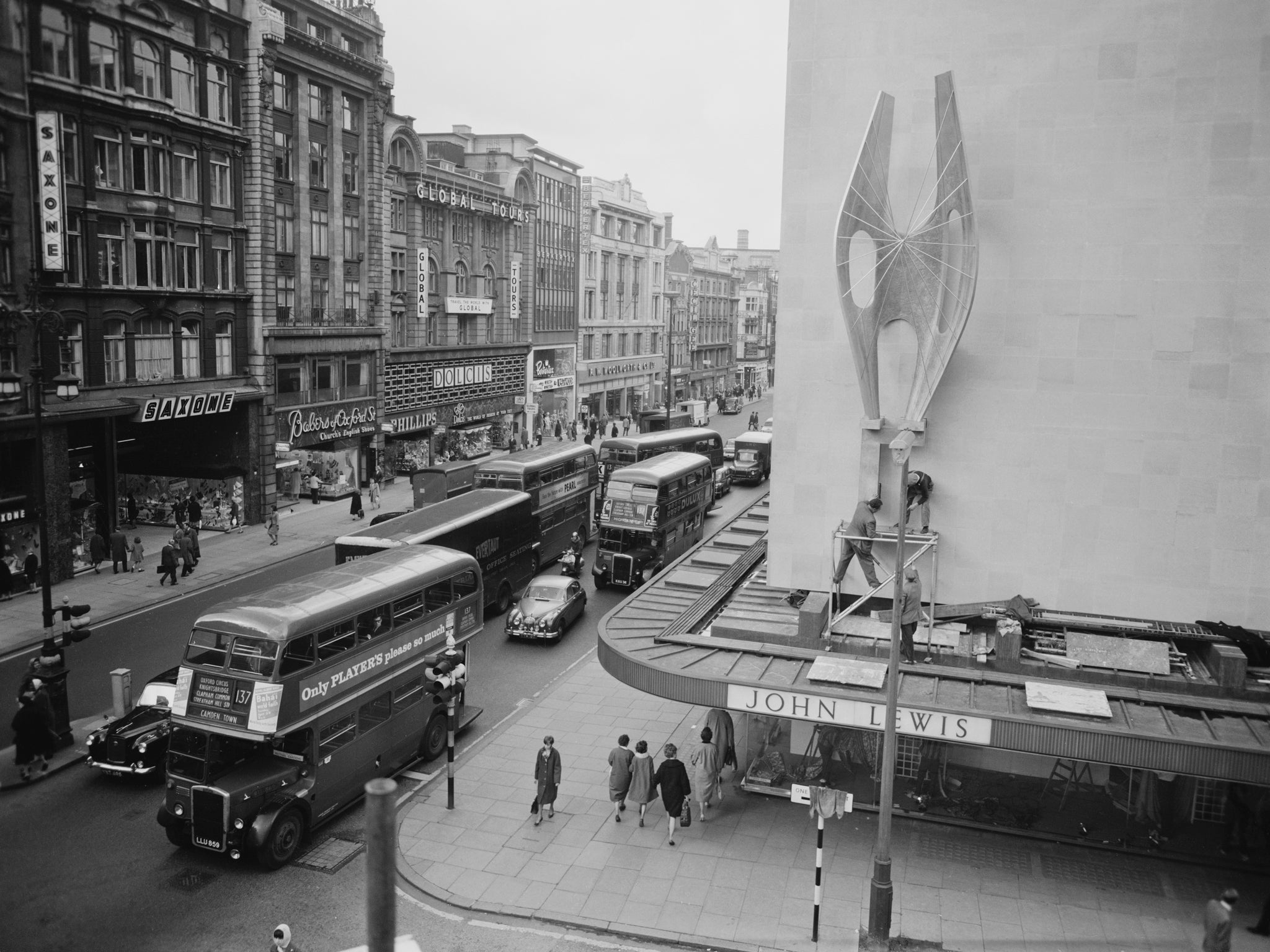 ‘Winged Figure’ by Hepworth is on display the day after its installation in 1963 on the side of the John Lewis department store in Oxford Street