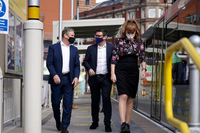 <p>Keir Starmer, left, with Andy Burnham, centre, and Angela Rayner on the campaign trail in April</p>