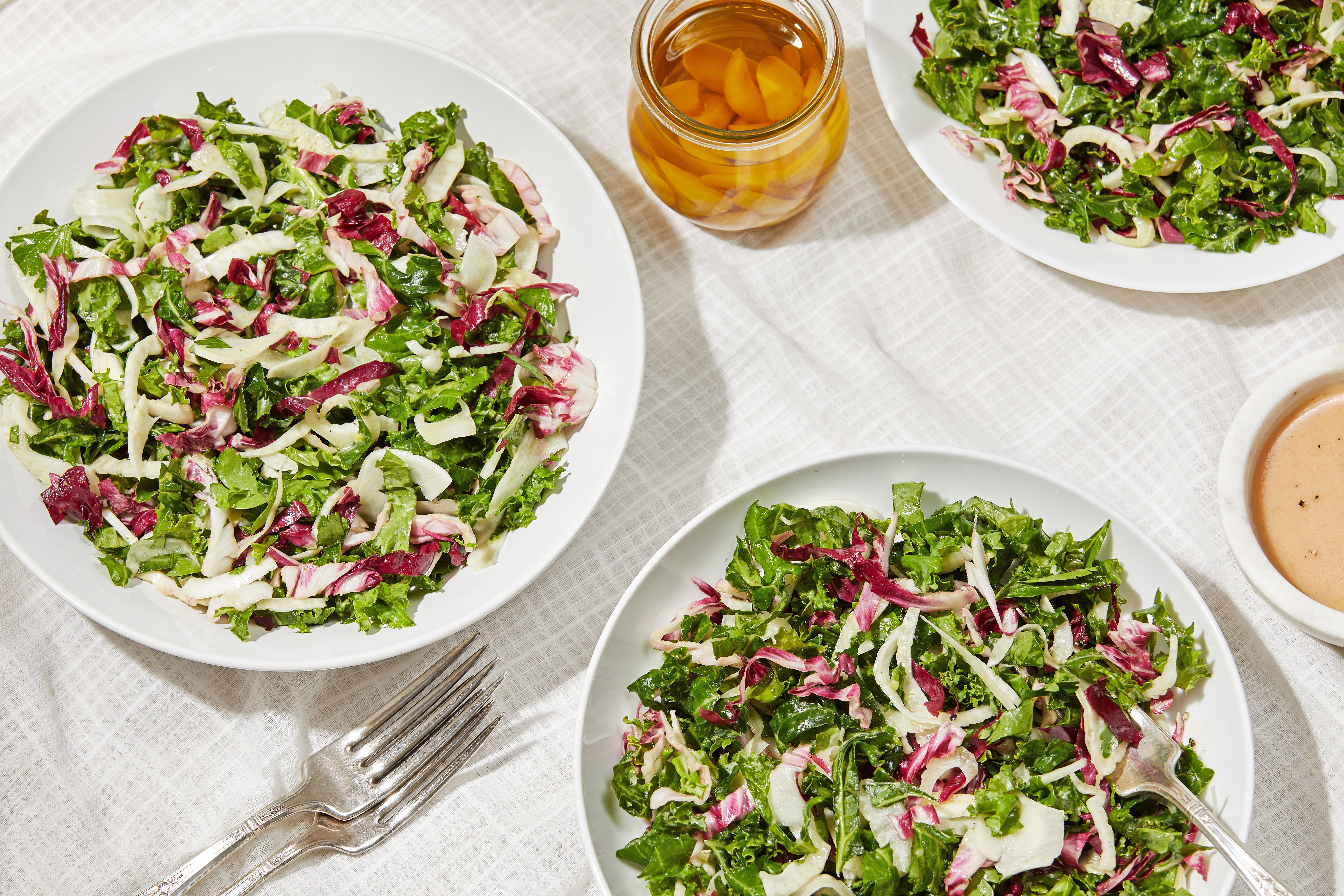 An eye-catching salad is treated to a boldly tasty, creamy garlic dressing