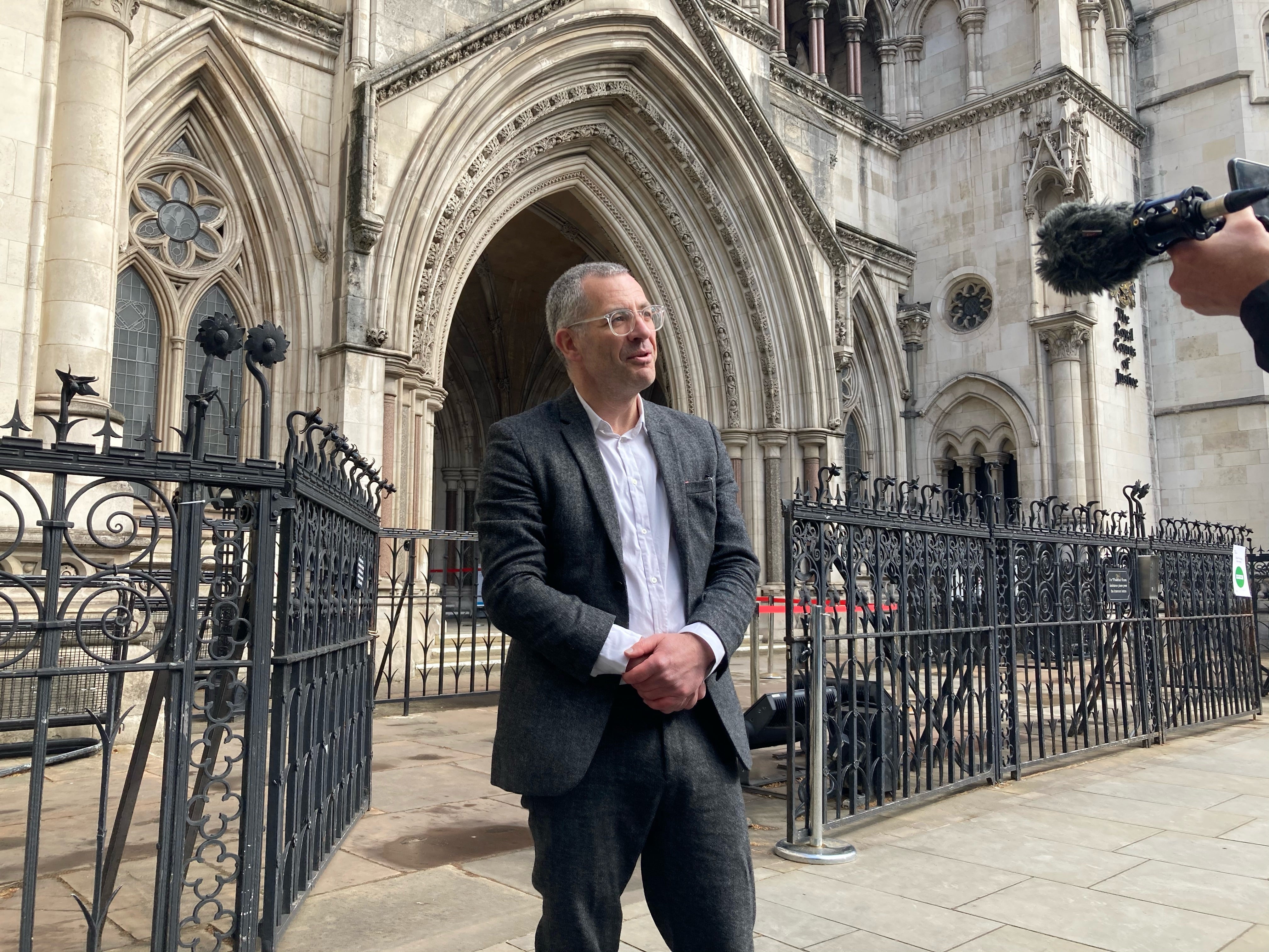 Tim Crosland speaks to media outside the Royal Courts of Justice, ahead of his hearing for contempt of court