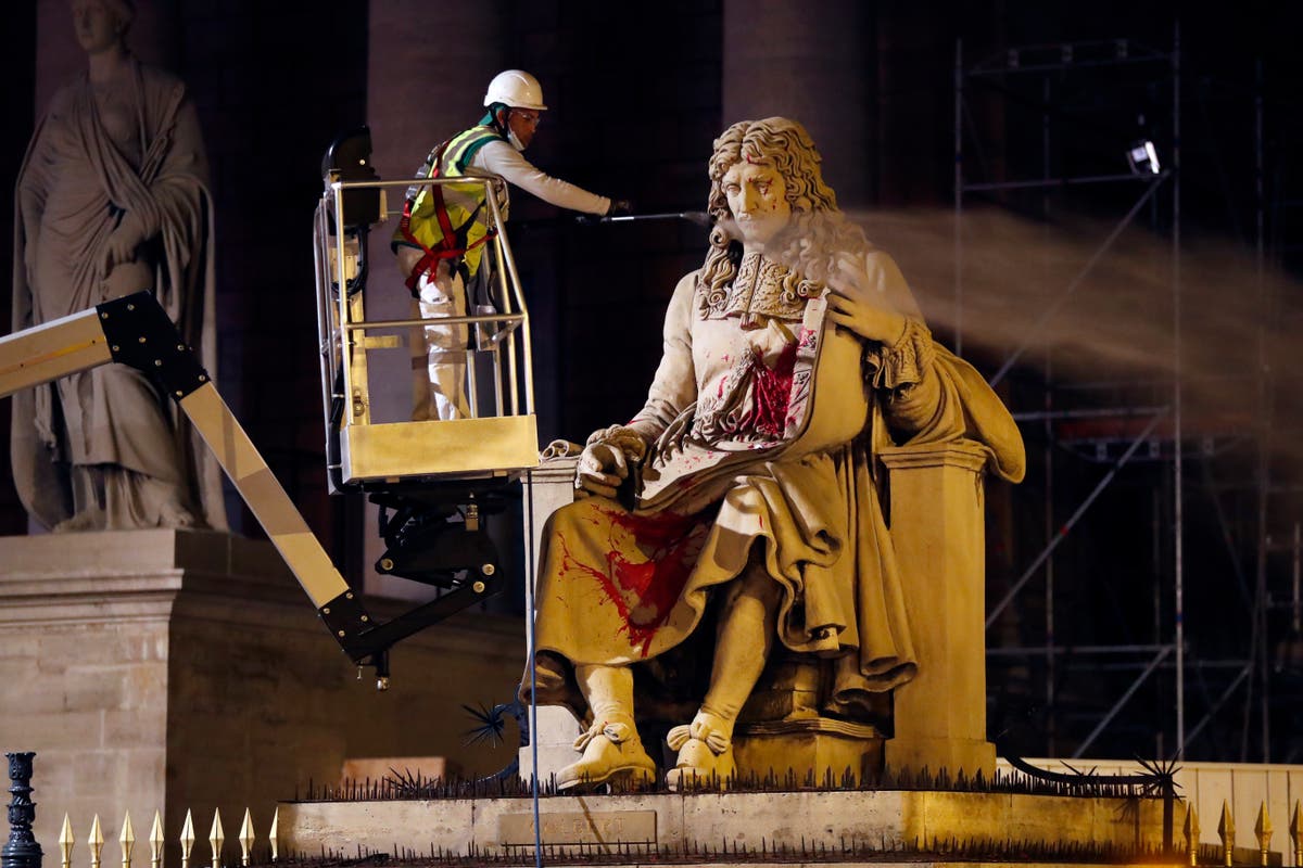 Paris court tries anti-racism activist for statue attack