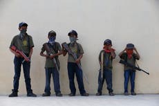 Mexican villages arm children in desperate bid for attention