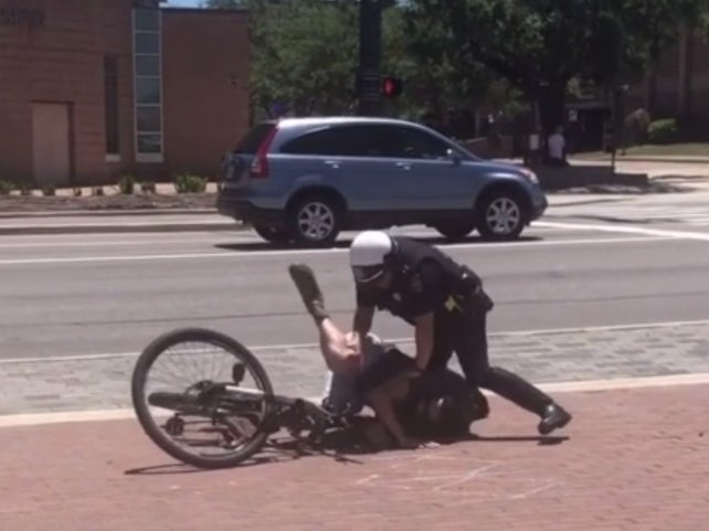 Footage showing College Station Police Department officers tackle a cyclist, who was tasered