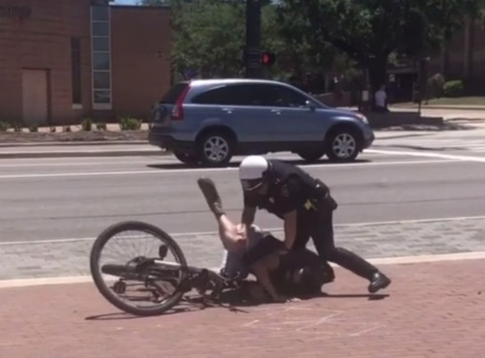 <p>Footage showing College Station Police Department officers tackle a cyclist, who was tasered </p>