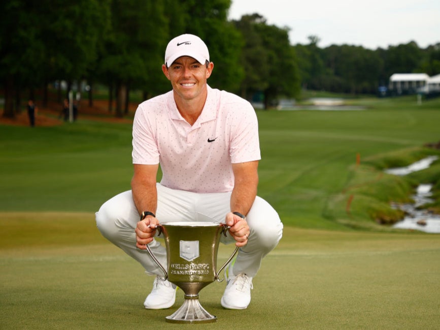 Rory McIlroy poses with the trophy at the Wells Fargo Championship
