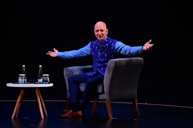 <p>File Image: CEO of Amazon Jeff Bezos (R) gestures during the Amazon's annual Smbhav event in New Delhi on 15 January 2020</p>