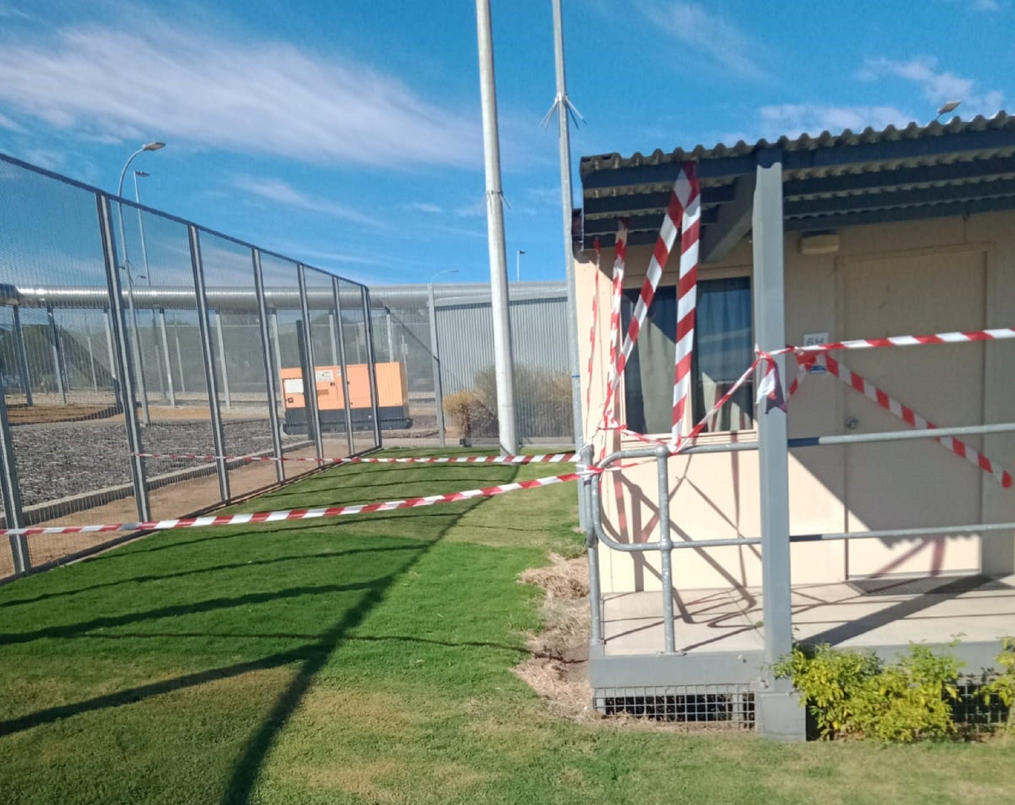 The tunnel was dug beneath an accommodation block in Falcon compound towards the fence pictured