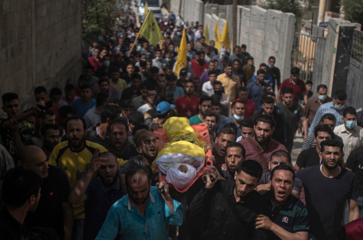 First funerals take place in Gaza after 26 Palestinians killed in airstrikes