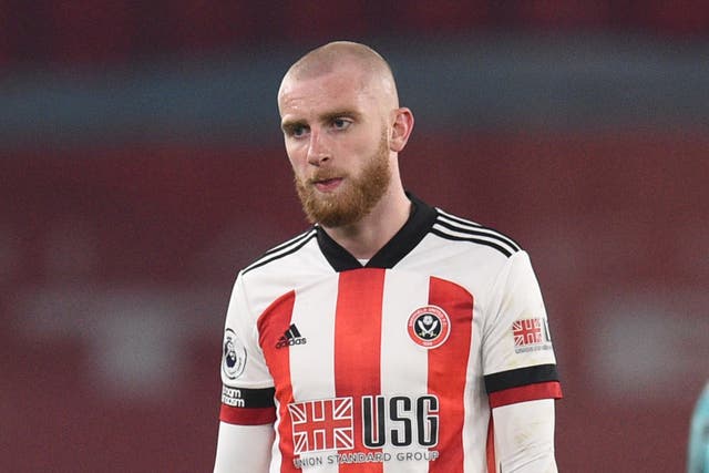 <p>Sheffield United striker Oli McBurnie appears to have stamped on a Nottingham Forest fan </p>