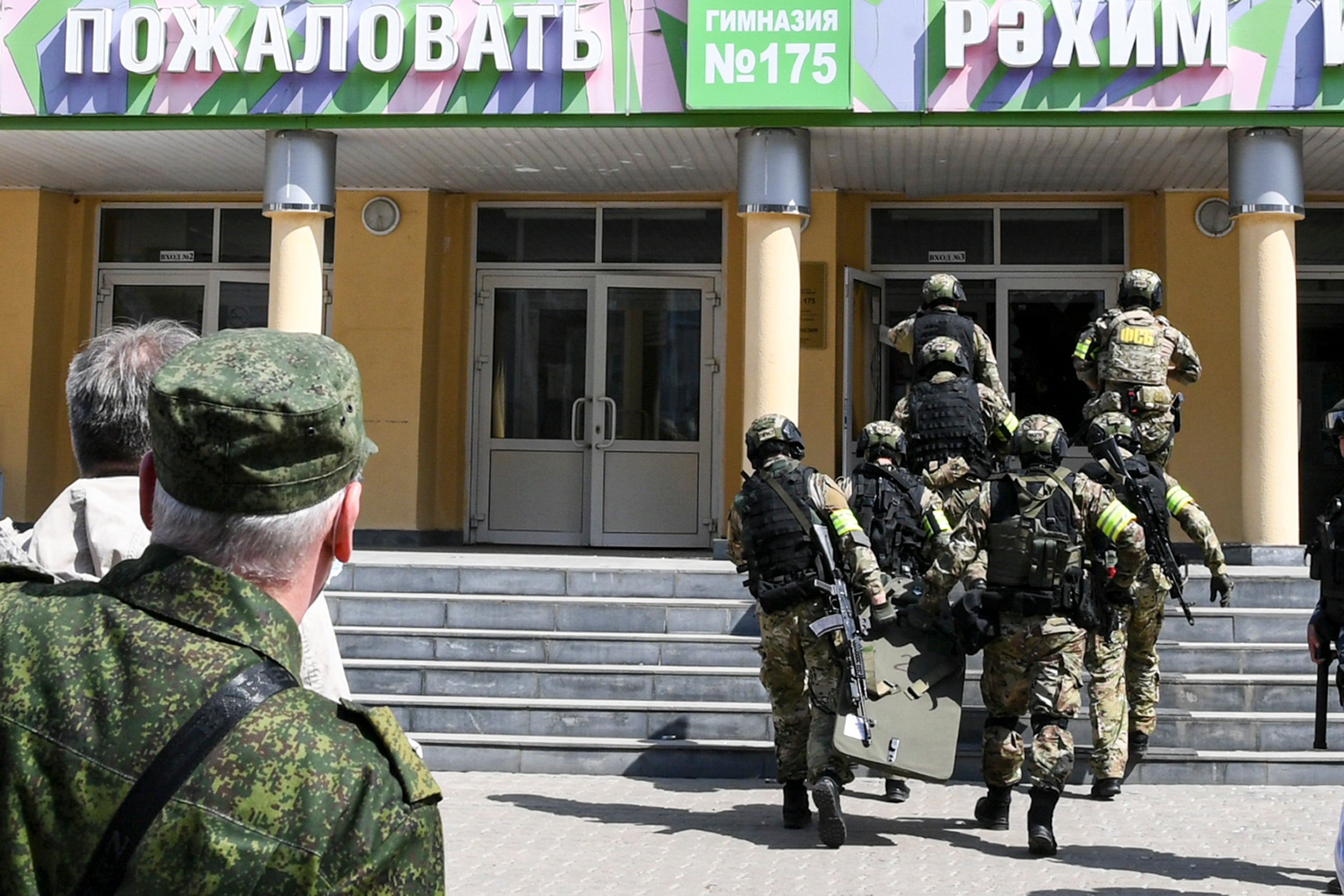 A Russian police special unit near the scene at a school after a shooting in Kazan