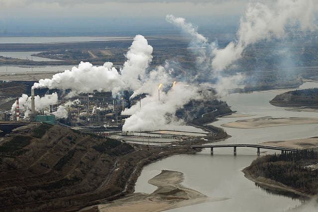 Aerial view of the Suncor oil sands extraction facility on the banks of the Athabasca River and near the town of Fort McMurray in Alberta Province, Canada 
