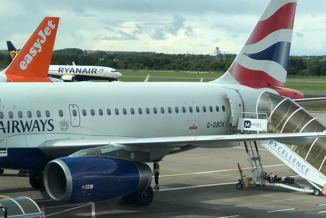 <p>EasyJet and British Airways planes at Edinburgh airport</p>