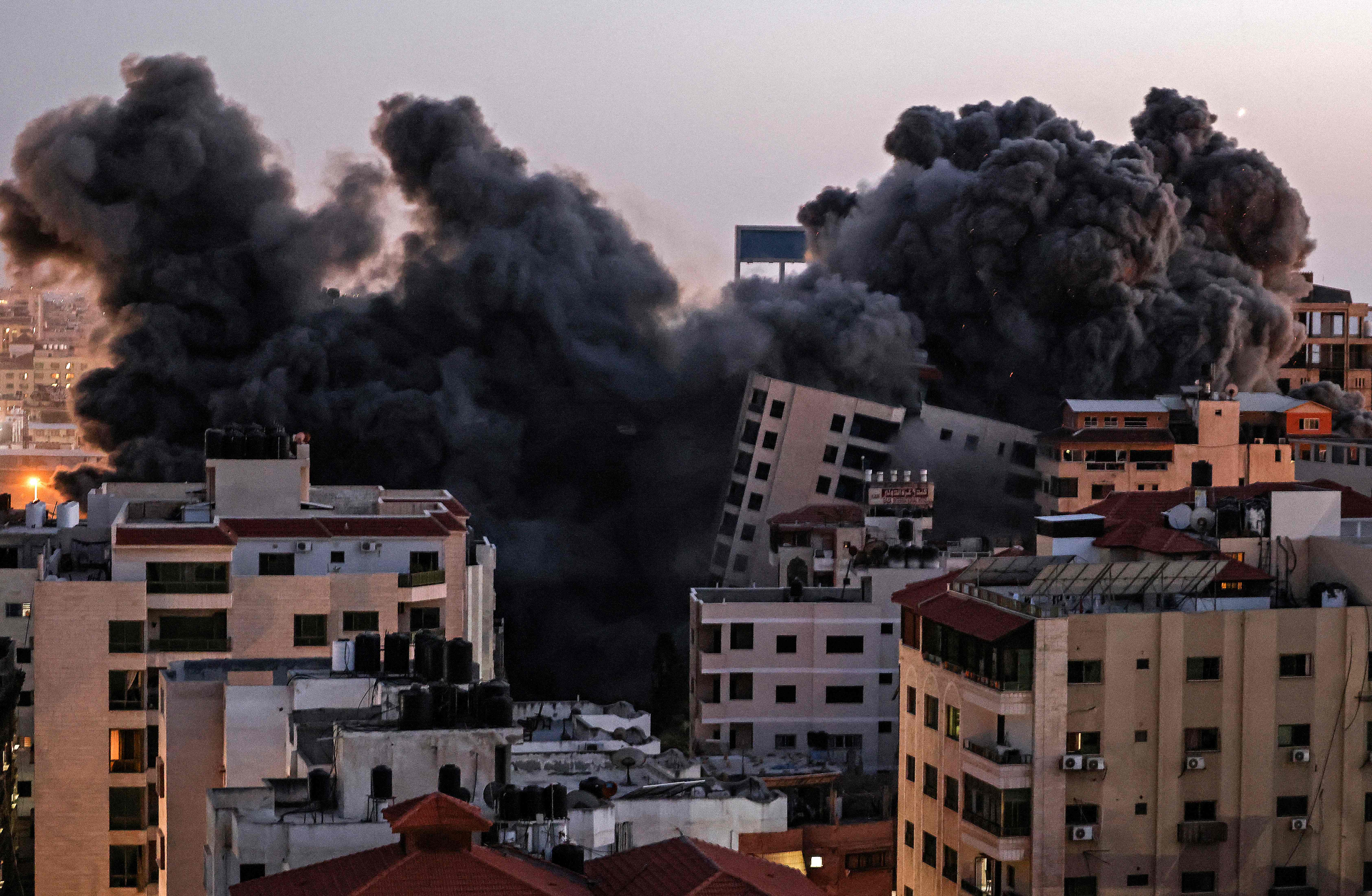 Smoke billows from an Israeli air strike on the Hanadi compound in Gaza City