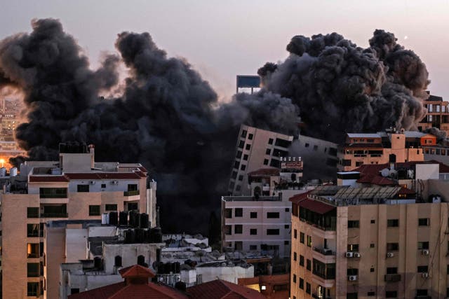 Smoke billows from an Israeli air strike on the Hanadi compound in Gaza City
