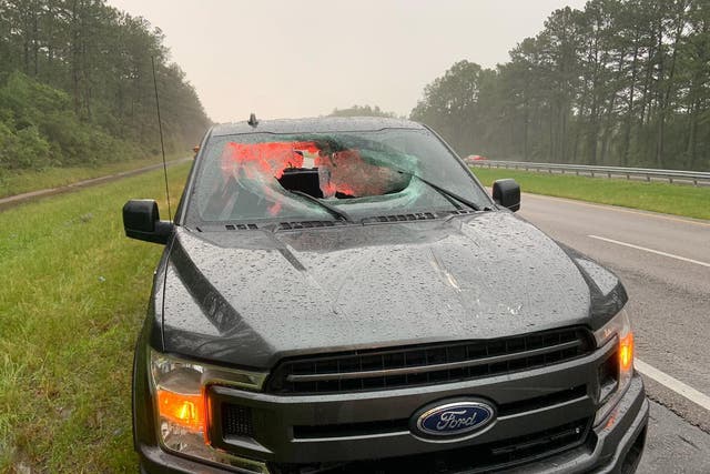<p>A chunk of roadway smashed the windshield of a truck near Pensacola, Florida</p>