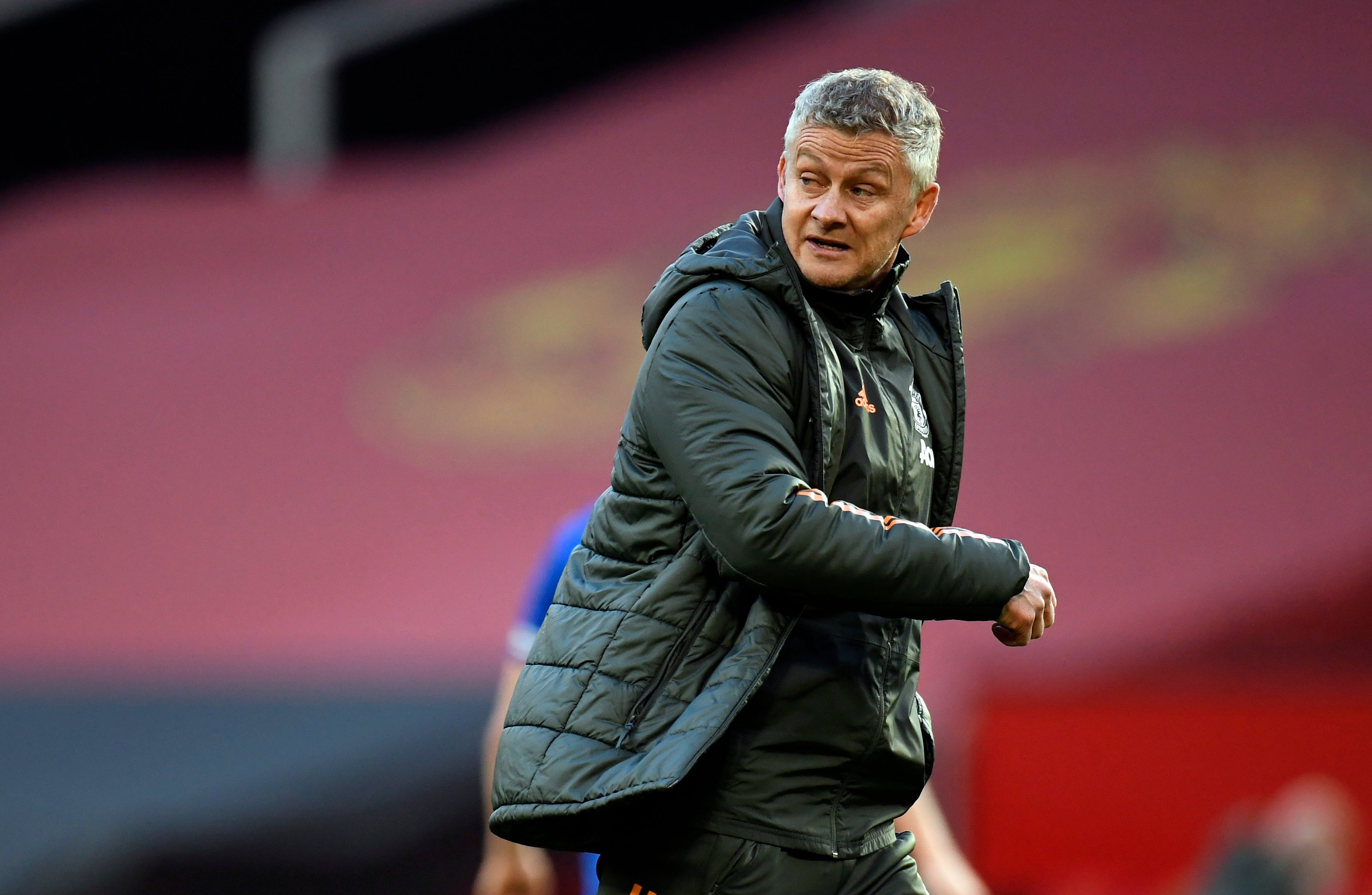 Ole Gunnar Solskjaer leaves the field after defeat by Leicester