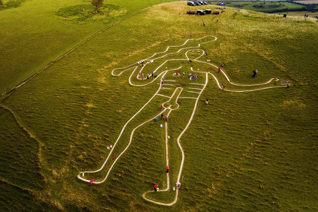 <p>Cerne Abbas Giant cleaning</p>