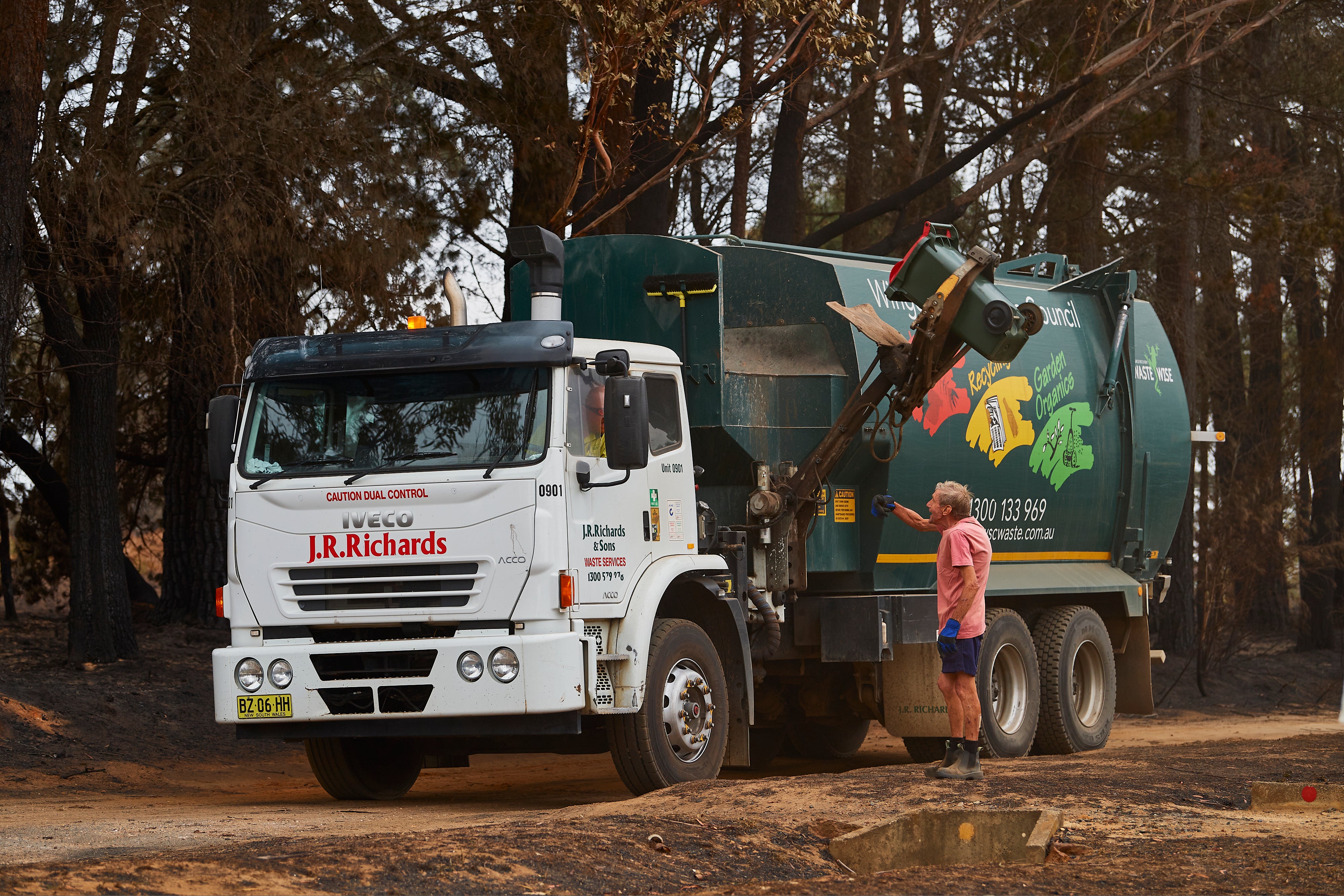 Representative: A garbage truck is pictured as it drives around town picking up residents bins as they are filled with burnt debris on 6 January 2020 in Wingello, Australia
