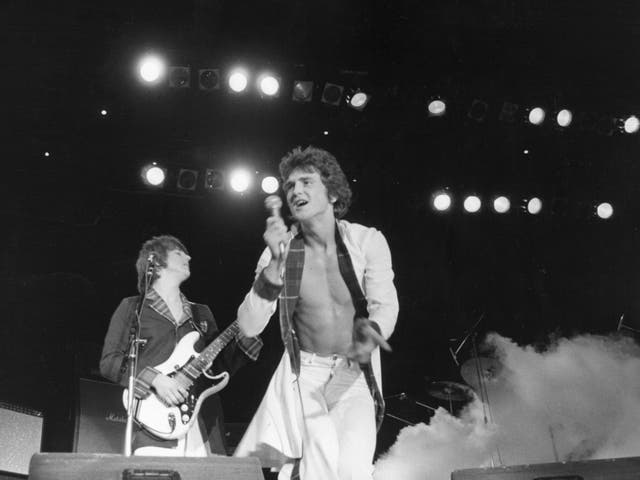 <p>The singer performing at the Budokan in Tokyo in 1976</p>