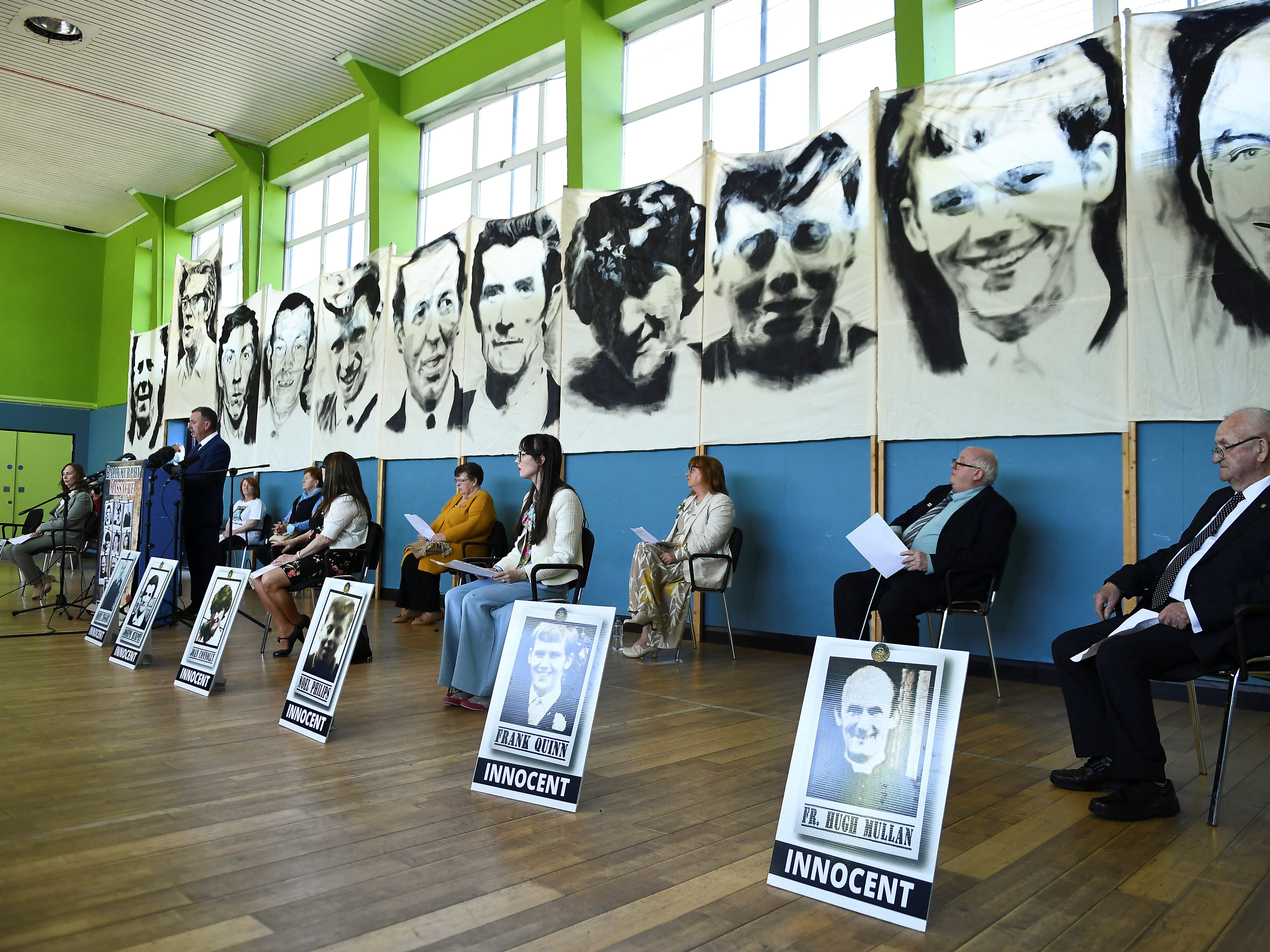 Family members of the Ballymurphy victims after listening to the findings of the inquest report